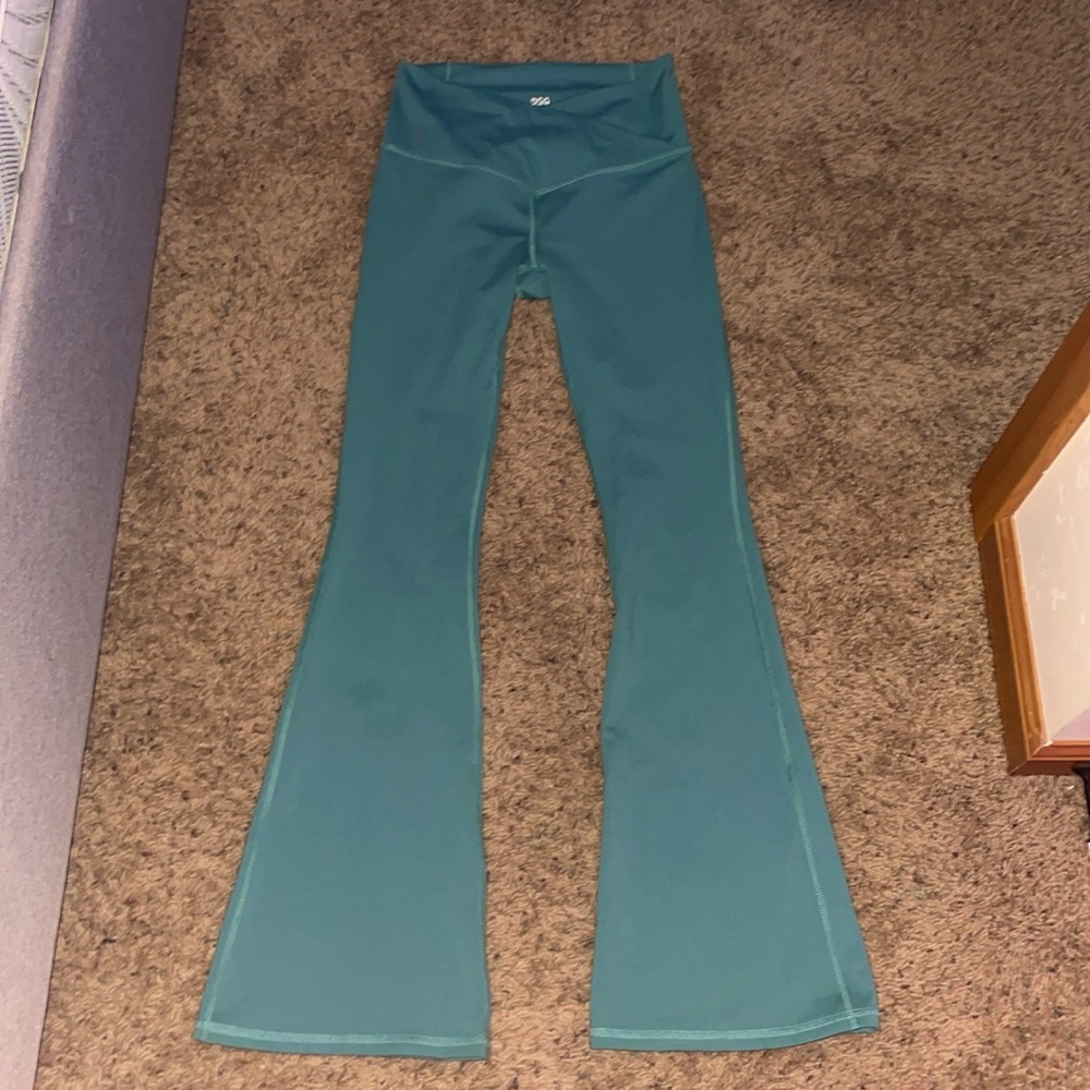 green flared leggings